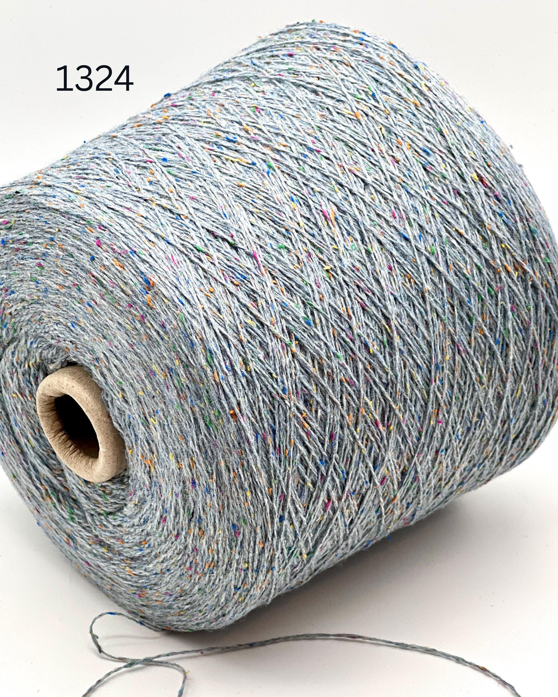 Profilo TULIP merino silk cotton yarn made in Italy
Luxury Italian lace yarn 700m per 100g close up texture
Merino cotton silk blend yarn for sweaters shawls and scarves
TULIP lightweight Italian yarn for elegant knitwear and weaving
Soft textured Italian lace yarn with silk and merino wool