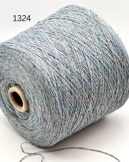Profilo TULIP merino silk cotton yarn made in Italy
Luxury Italian lace yarn 700m per 100g close up texture
Merino cotton silk blend yarn for sweaters shawls and scarves
TULIP lightweight Italian yarn for elegant knitwear and weaving
Soft textured Italian lace yarn with silk and merino wool