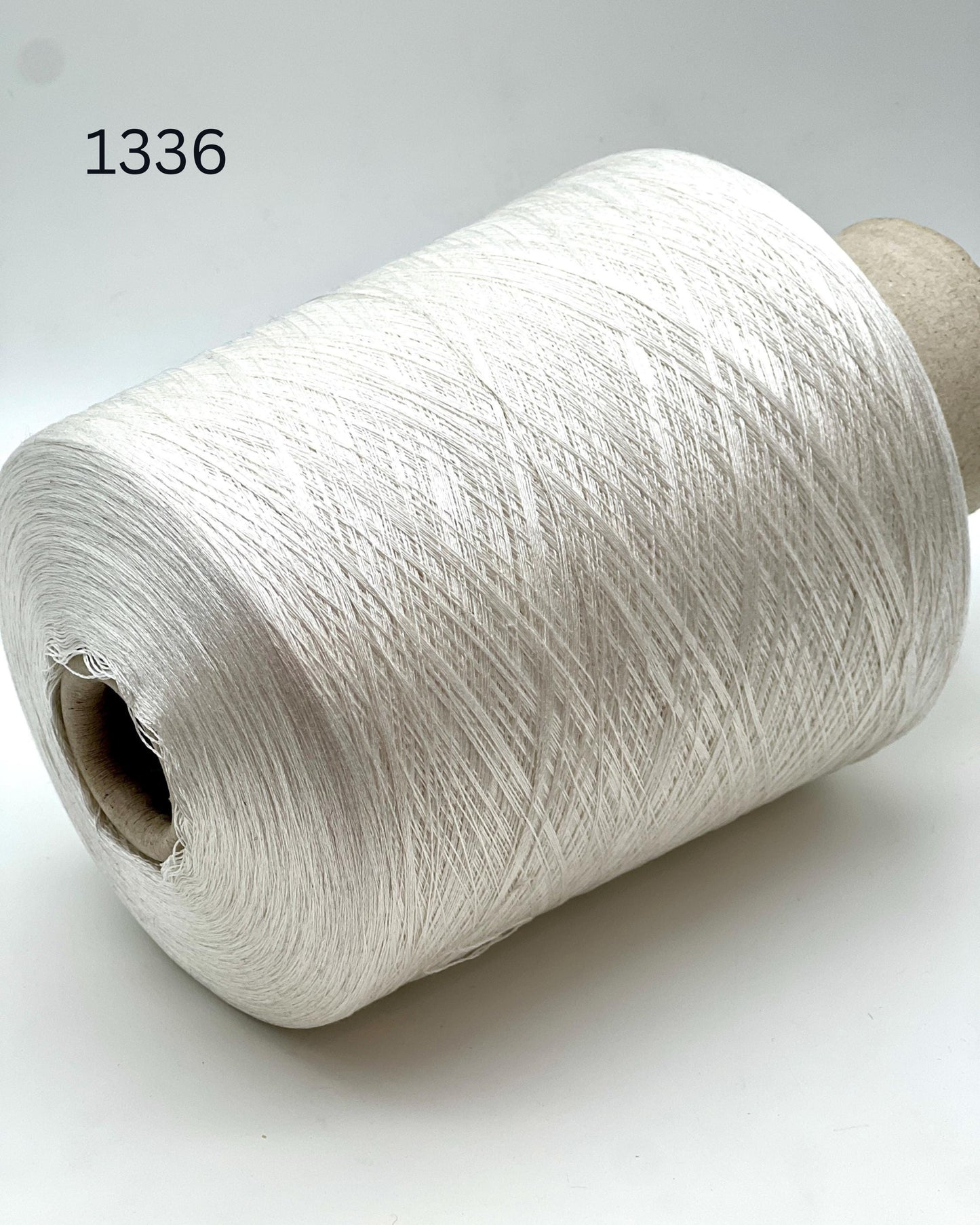 Luxury Italian mulberry silk yarn SESIA Precious Silk
Ultra-fine mulberry silk lace yarn for shawls and weaving
Italian silk yarn with luminous soft texture close up
SESIA precious mulberry silk yarn for couture knitwear
Luxury silk lace yarn for crochet sweaters and weaving