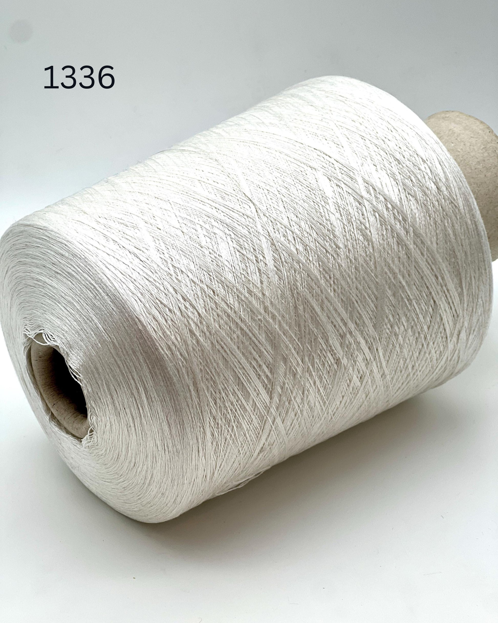 Luxury Italian mulberry silk yarn SESIA Precious Silk
Ultra-fine mulberry silk lace yarn for shawls and weaving
Italian silk yarn with luminous soft texture close up
SESIA precious mulberry silk yarn for couture knitwear
Luxury silk lace yarn for crochet sweaters and weaving