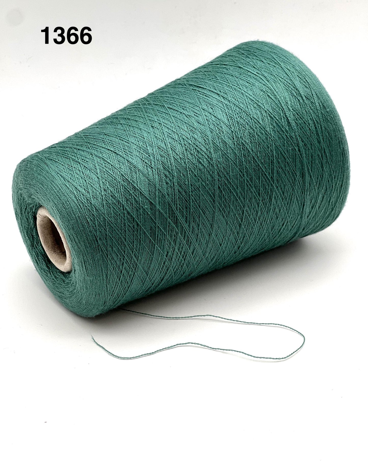Green spool of thread on a white background with number 1366.
