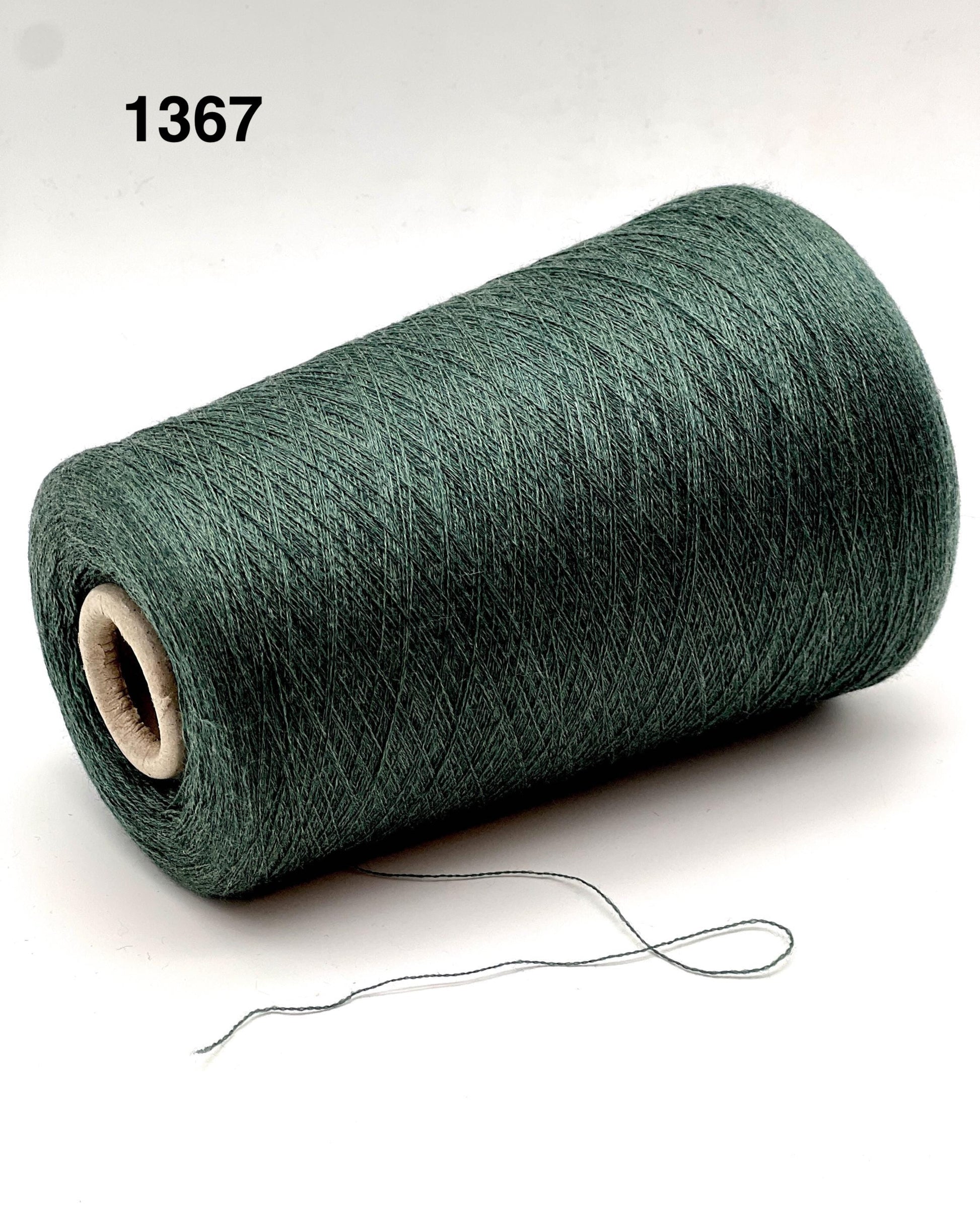 Roll of green thread on a white background with number 1367.