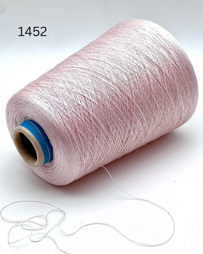 Luxury Italian mulberry silk yarn SESIA Precious Silk
Ultra-fine mulberry silk lace yarn for shawls and weaving
Italian silk yarn with luminous soft texture close up
SESIA precious mulberry silk yarn for couture knitwear
Luxury silk lace yarn for crochet sweaters and weaving
