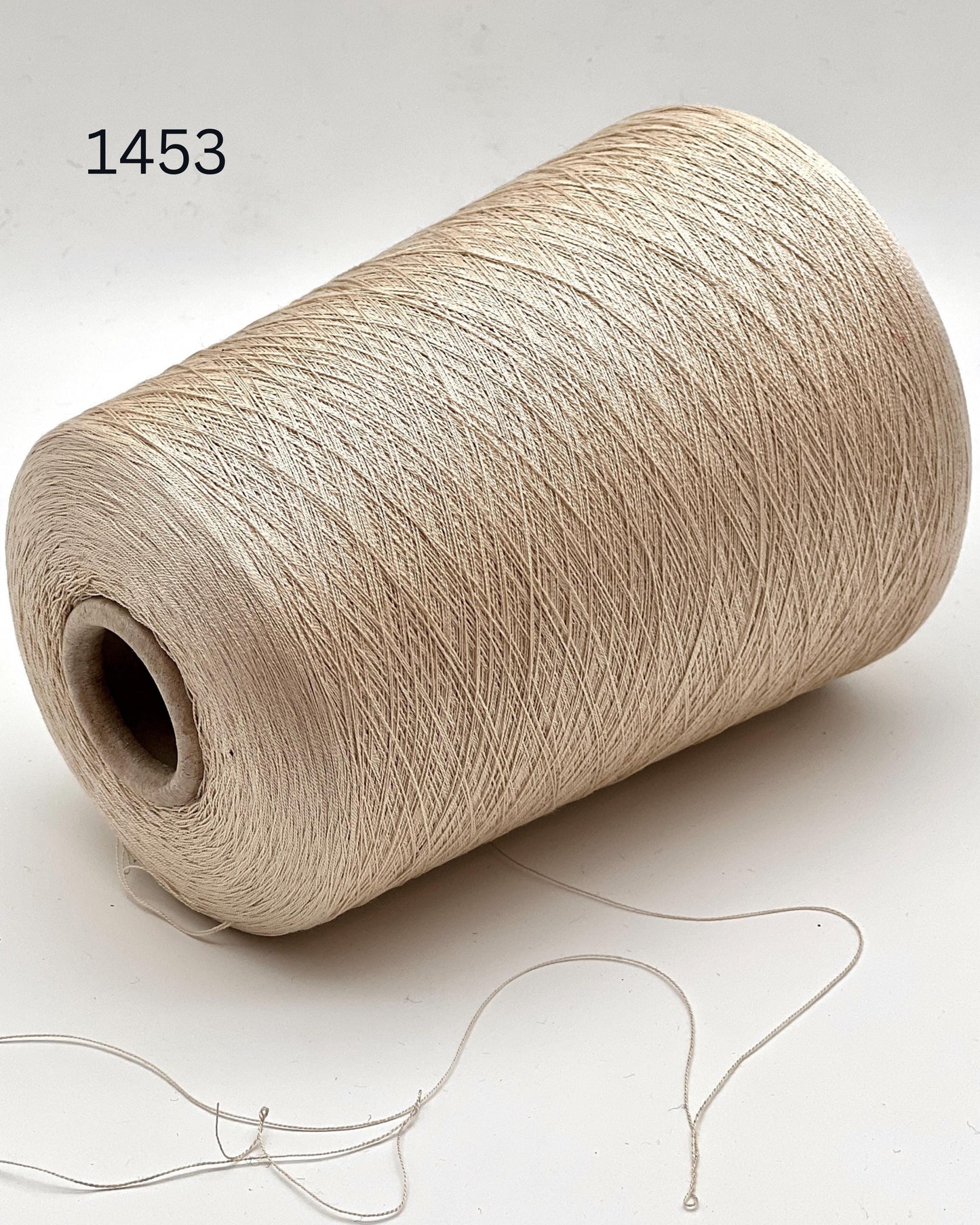 Luxury Italian mulberry silk yarn SESIA Precious Silk
Ultra-fine mulberry silk lace yarn for shawls and weaving
Italian silk yarn with luminous soft texture close up
SESIA precious mulberry silk yarn for couture knitwear
Luxury silk lace yarn for crochet sweaters and weaving