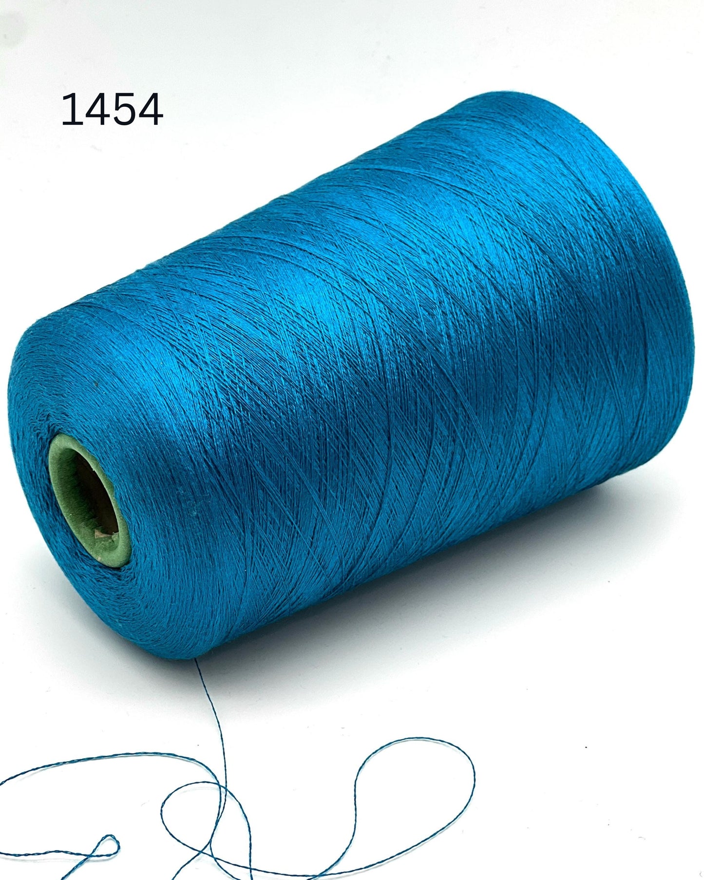 Luxury Italian mulberry silk yarn SESIA Precious Silk
Ultra-fine mulberry silk lace yarn for shawls and weaving
Italian silk yarn with luminous soft texture close up
SESIA precious mulberry silk yarn for couture knitwear
Luxury silk lace yarn for crochet sweaters and weaving