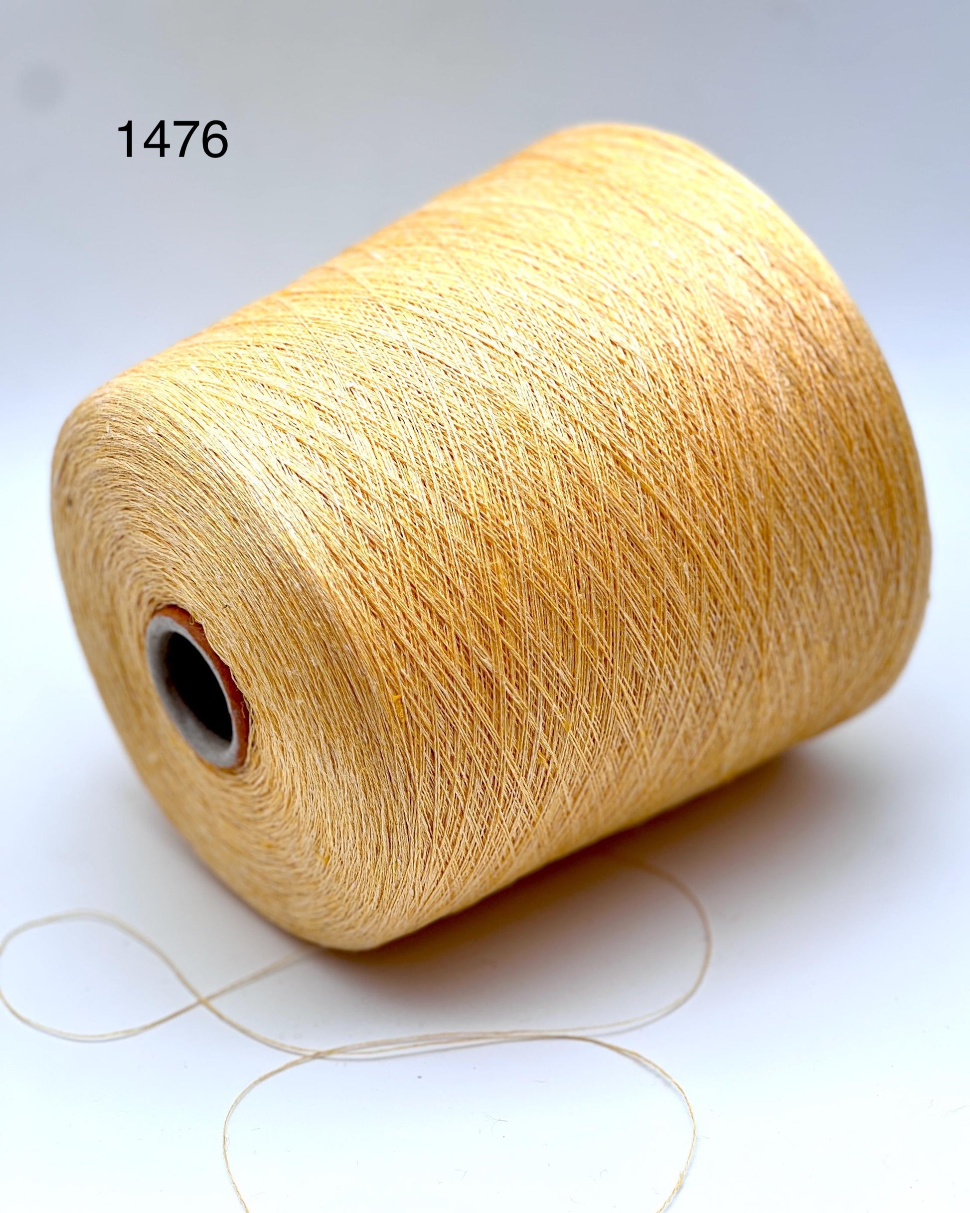 Servizi E Seta LINO linen yarn cone 1300m Italy
Luxury Italian 100 percent linen lace yarn close up
Fine linen yarn for summer tops weaving and blending
LINO linen yarn 1300m per 100g natural matte texture
Italian linen lace yarn for breathable garments and wraps