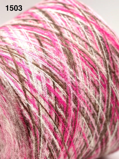 Close-up of a ball of yarn with pink and brown colors.