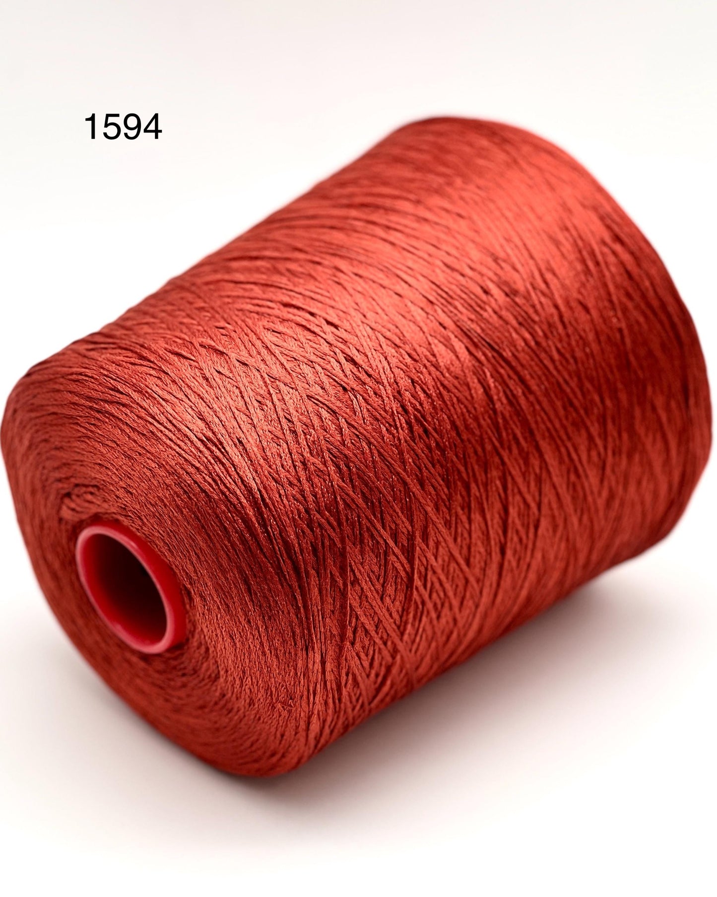 Luxury iDOKNiT fine weight yarn, SETA SHAPPE by Filati Buratti Italy. 100% Seta Shappe Silk with a unique chainette construction for superior elasticity and drape, 600m/100g. Authentic Italian-made silk on cones, color 2153 White, curated by iDOKNiT for high-end hand and machine knitting projects.