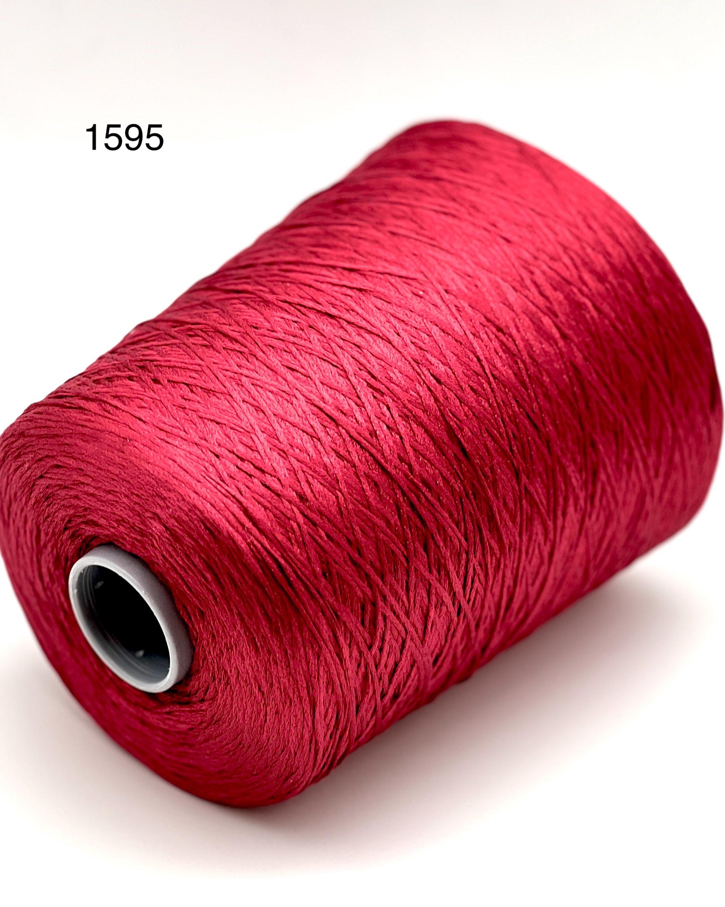 Luxury iDOKNiT fine weight yarn, SETA SHAPPE by Filati Buratti Italy. 100% Seta Shappe Silk with a unique chainette construction for superior elasticity and drape, 600m/100g. Authentic Italian-made silk on cones, color 2153 White, curated by iDOKNiT for high-end hand and machine knitting projects.