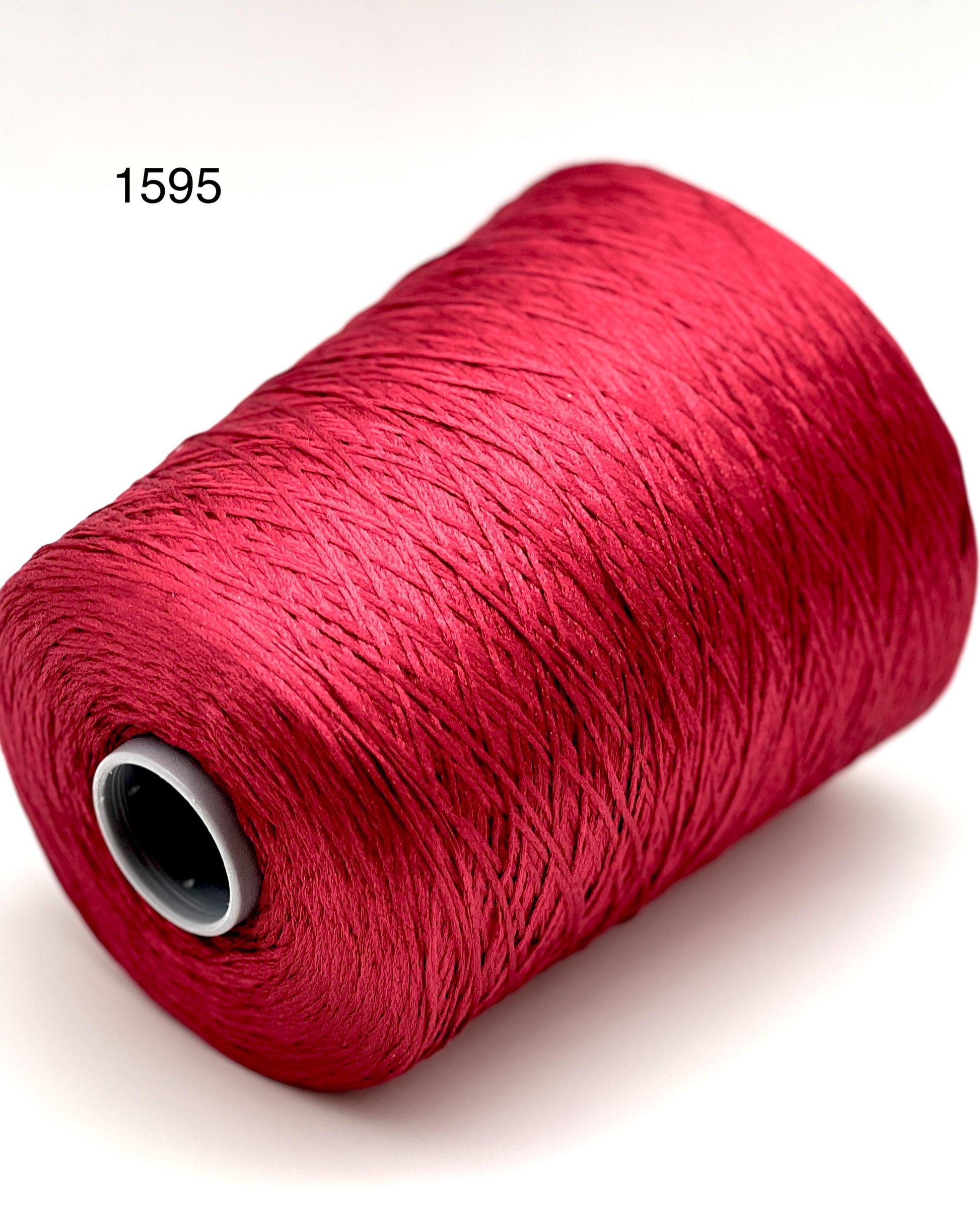Luxury iDOKNiT fine weight yarn, SETA SHAPPE by Filati Buratti Italy. 100% Seta Shappe Silk with a unique chainette construction for superior elasticity and drape, 600m/100g. Authentic Italian-made silk on cones, color 2153 White, curated by iDOKNiT for high-end hand and machine knitting projects.
