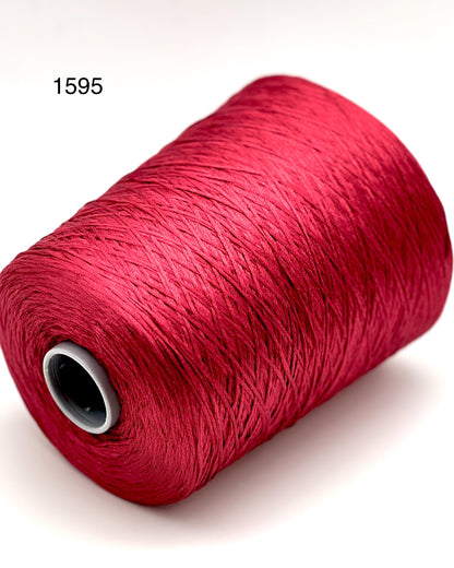 Luxury iDOKNiT fine weight yarn, SETA SHAPPE by Filati Buratti Italy. 100% Seta Shappe Silk with a unique chainette construction for superior elasticity and drape, 600m/100g. Authentic Italian-made silk on cones, color 2153 White, curated by iDOKNiT for high-end hand and machine knitting projects.