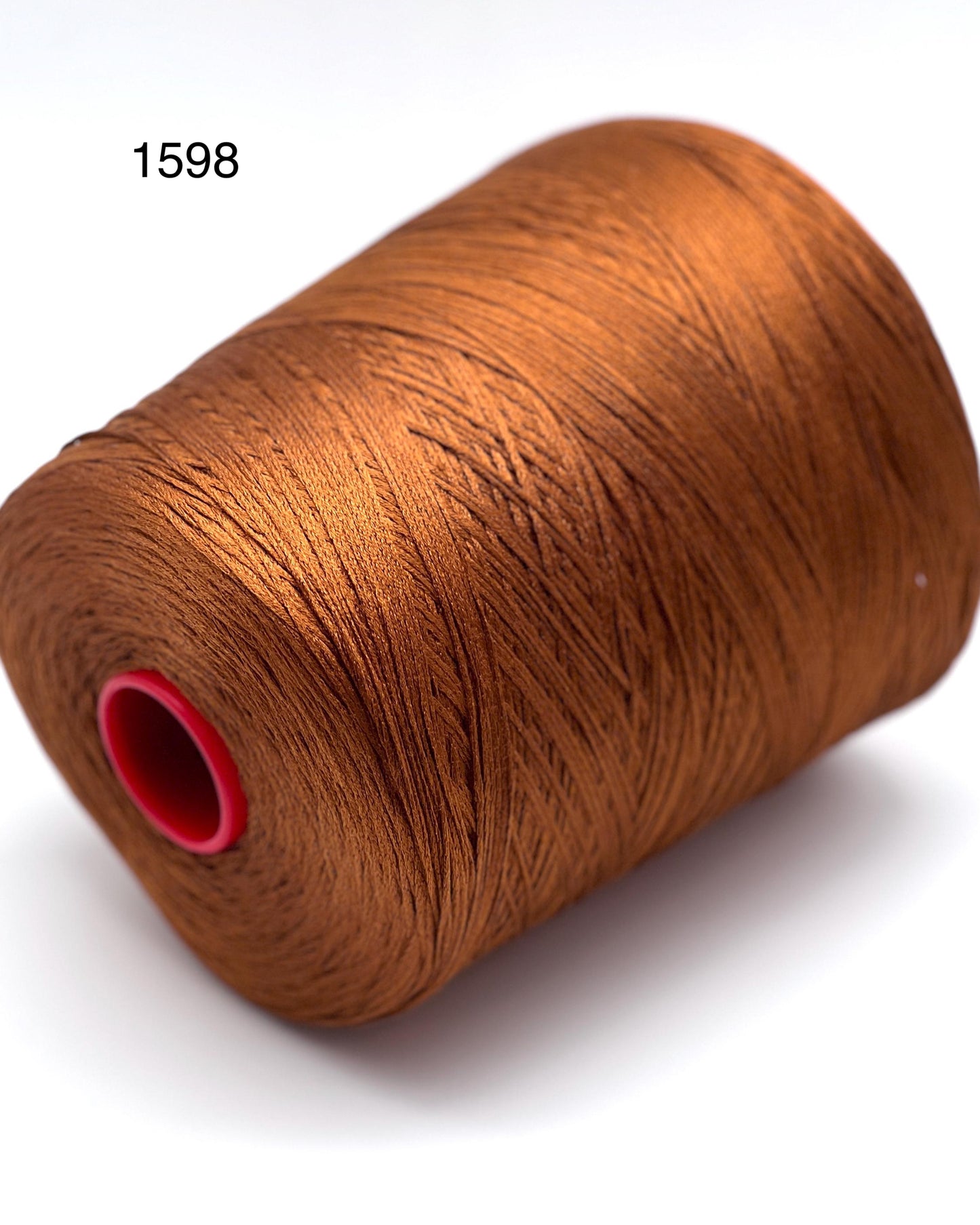 Luxury iDOKNiT fine weight yarn, SETA SHAPPE by Filati Buratti Italy. 100% Seta Shappe Silk with a unique chainette construction for superior elasticity and drape, 600m/100g. Authentic Italian-made silk on cones, color 2153 White, curated by iDOKNiT for high-end hand and machine knitting projects.