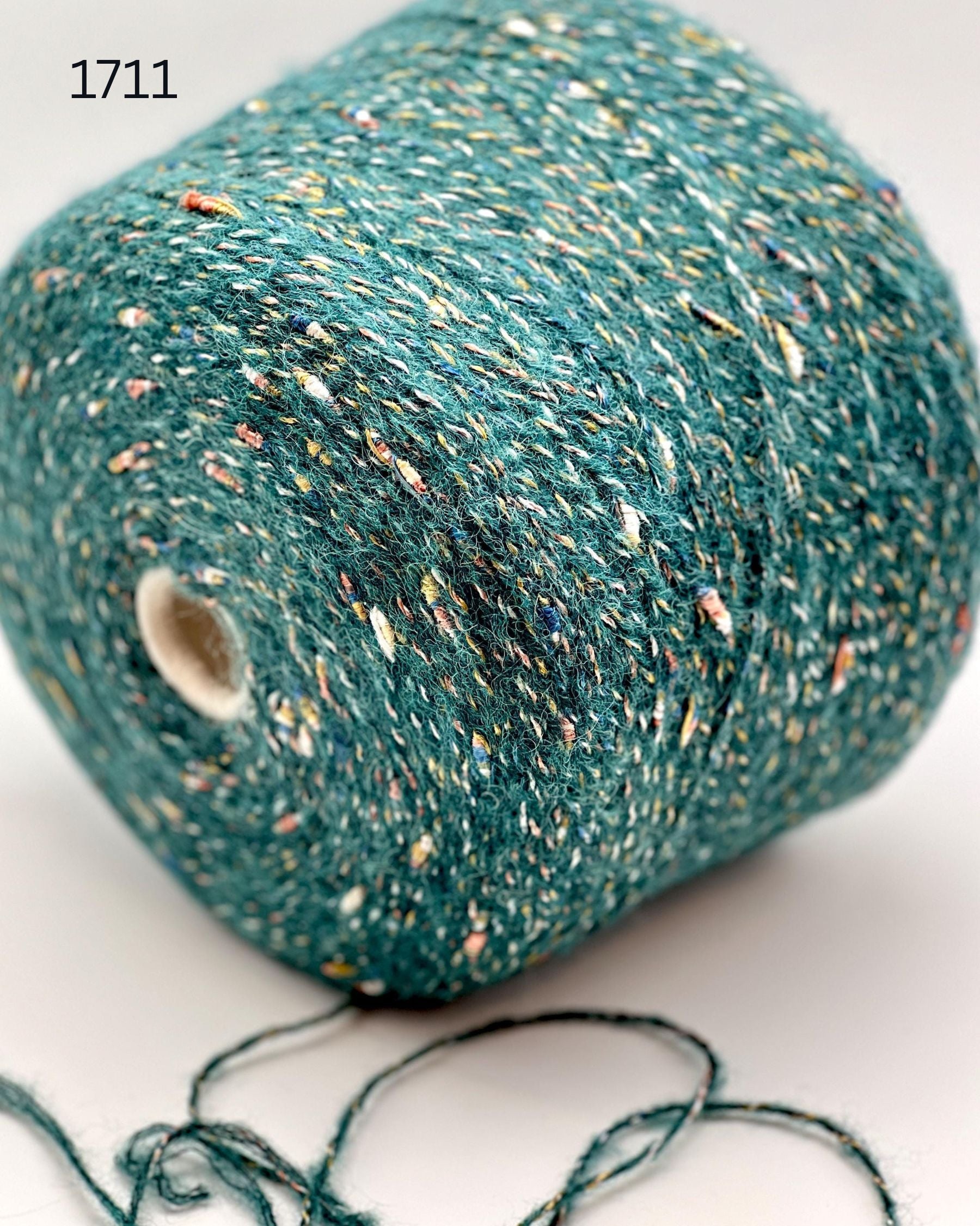RiGo Taurus Italian baby alpaca boucle textured aran weight yarn in hand wound balls from iDOKNiT