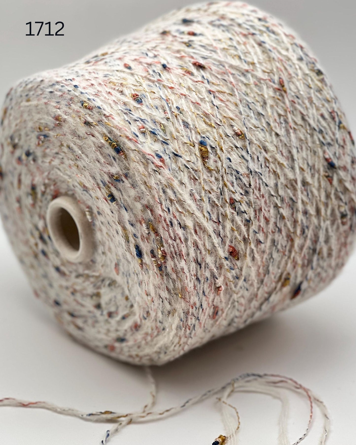RiGo Taurus Italian baby alpaca boucle textured aran weight yarn in hand wound balls from iDOKNiT