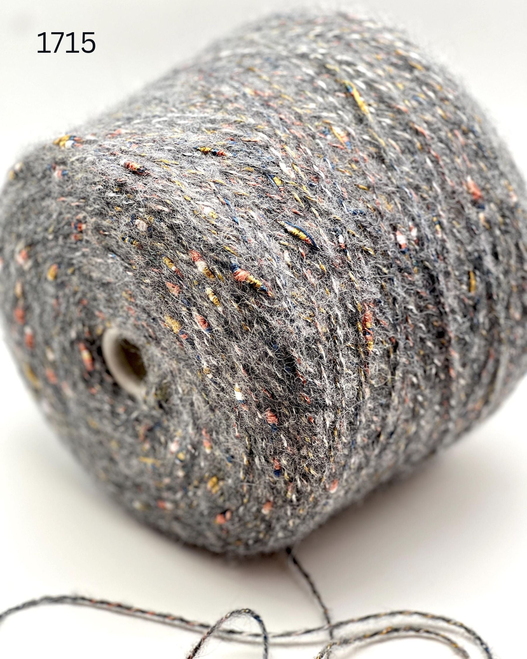 RiGo Taurus Italian baby alpaca boucle textured aran weight yarn in hand wound balls from iDOKNiT