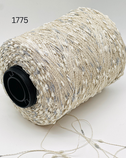 Luxury Italian cotton lurex yarn SUNFLOWER by RiGo
Textured cocoon sparkle yarn for Chanel style knitting
Italian lace weight cotton yarn with lurex cocoons
RiGo SUNFLOWER artistic textured fashion yarn
Luxury Italian yarn for couture knitwear and weaving