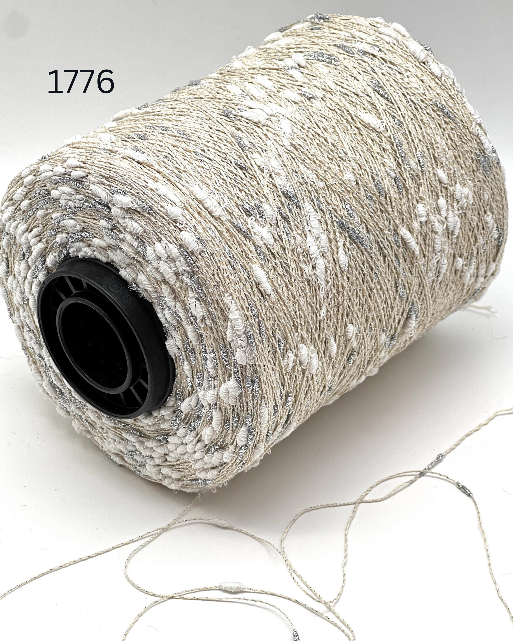Luxury Italian cotton lurex yarn SUNFLOWER by RiGo
Textured cocoon sparkle yarn for Chanel style knitting
Italian lace weight cotton yarn with lurex cocoons
RiGo SUNFLOWER artistic textured fashion yarn
Luxury Italian yarn for couture knitwear and weaving