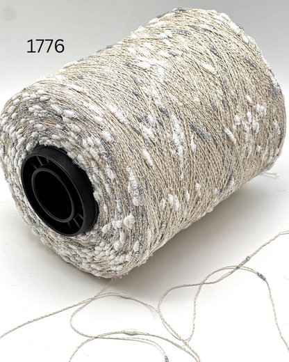 Luxury Italian cotton lurex yarn SUNFLOWER by RiGo
Textured cocoon sparkle yarn for Chanel style knitting
Italian lace weight cotton yarn with lurex cocoons
RiGo SUNFLOWER artistic textured fashion yarn
Luxury Italian yarn for couture knitwear and weaving
