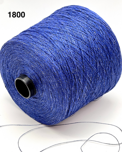 Blue spool of yarn with a black core on a white background