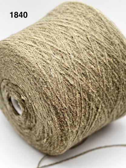 Close-up of a roll of beige twine with a white background, color 1840