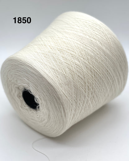 Spool of white yarn labeled '1850' on a light background