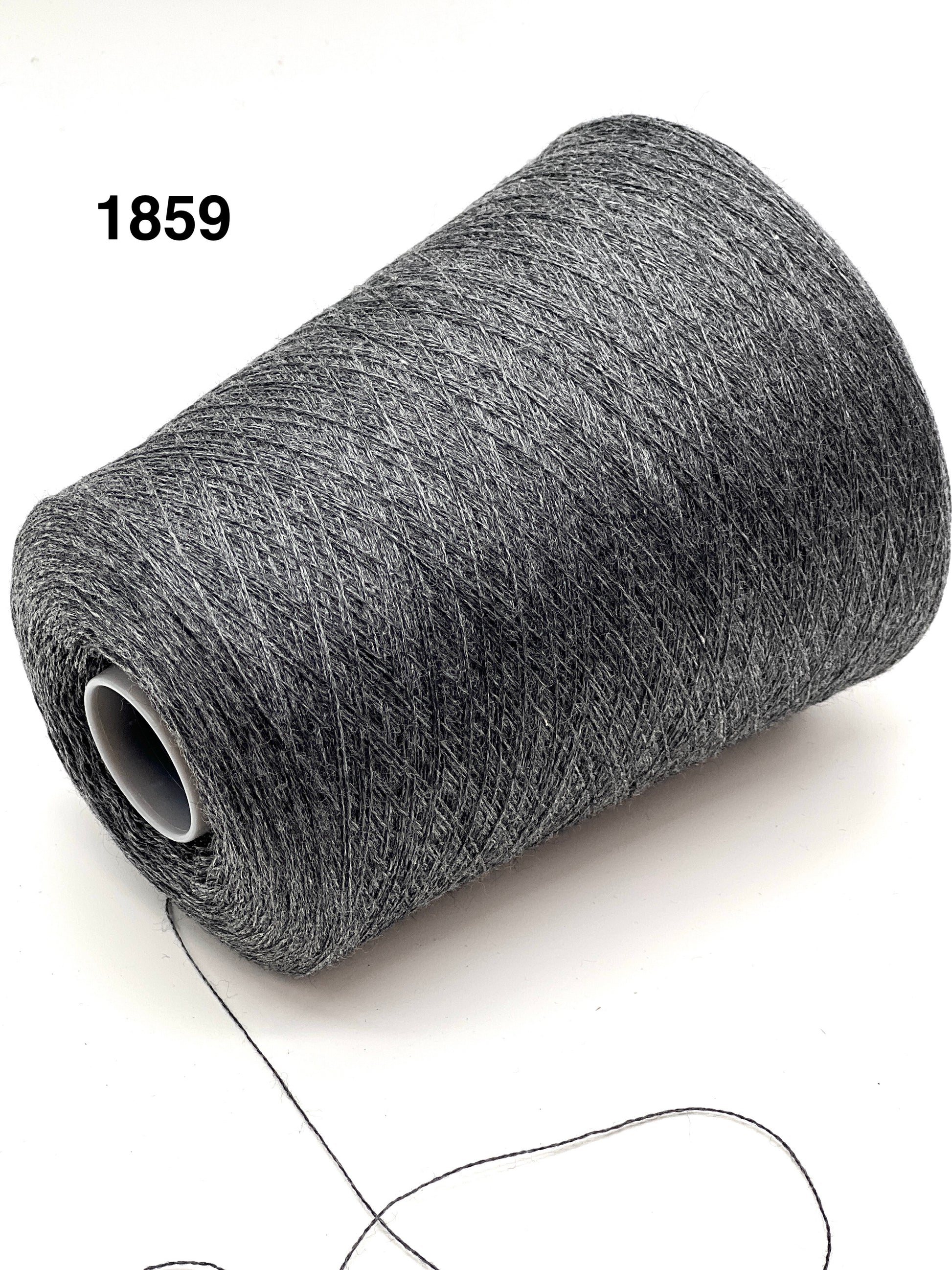 Roll of gray thread on a white background with number 1859.