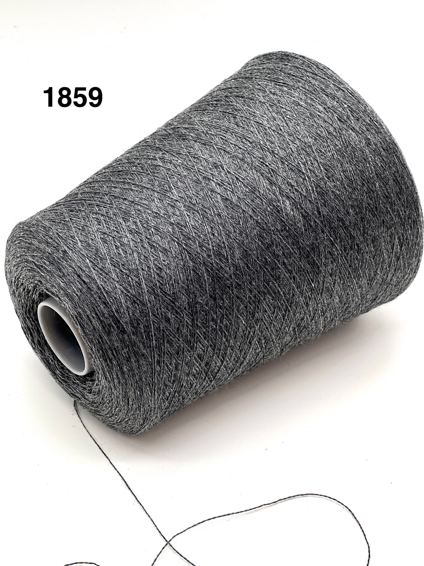 Roll of gray thread on a white background with number 1859.