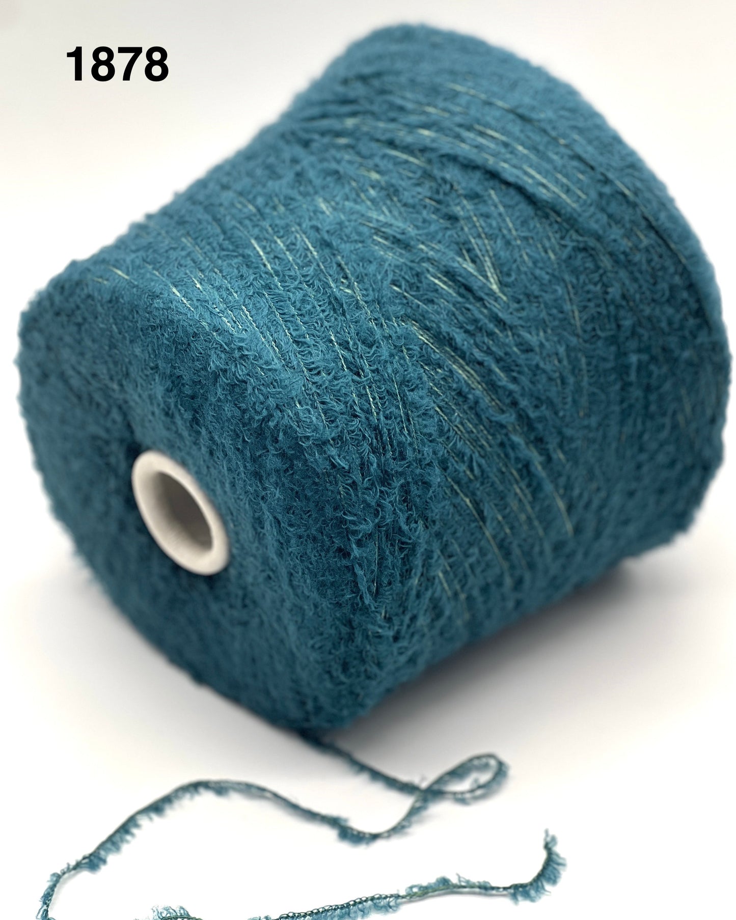 Blue yarn spool on a white background