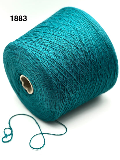 Teal spool of yarn on a white background with '1883' text.