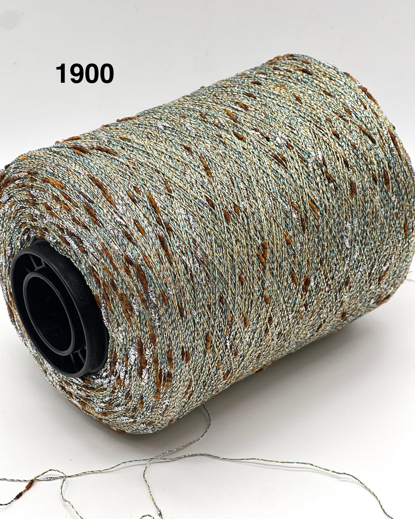 Spool of thread labeled '1900' on a white background