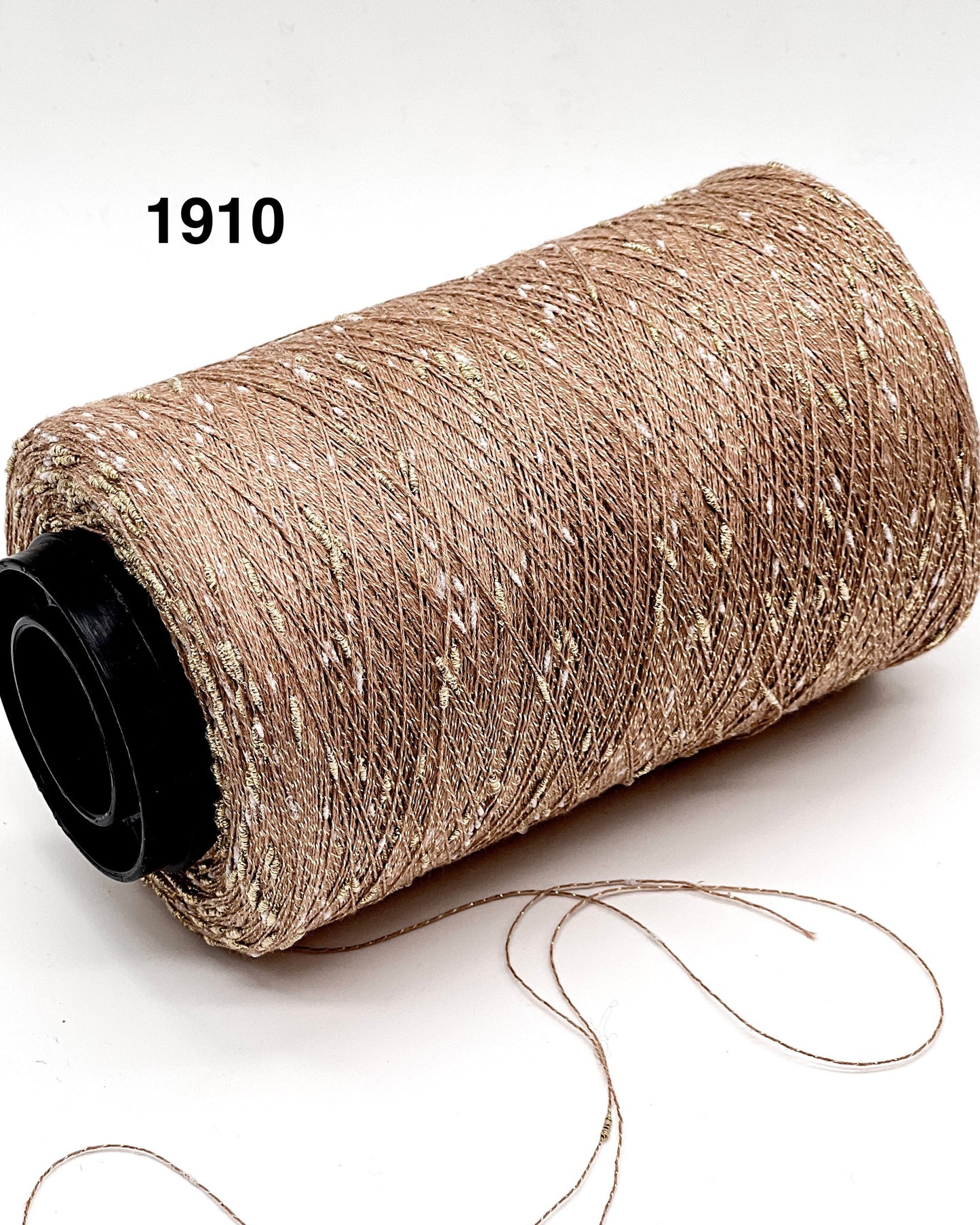 Spool of brown thread with a visible brand number on a white background