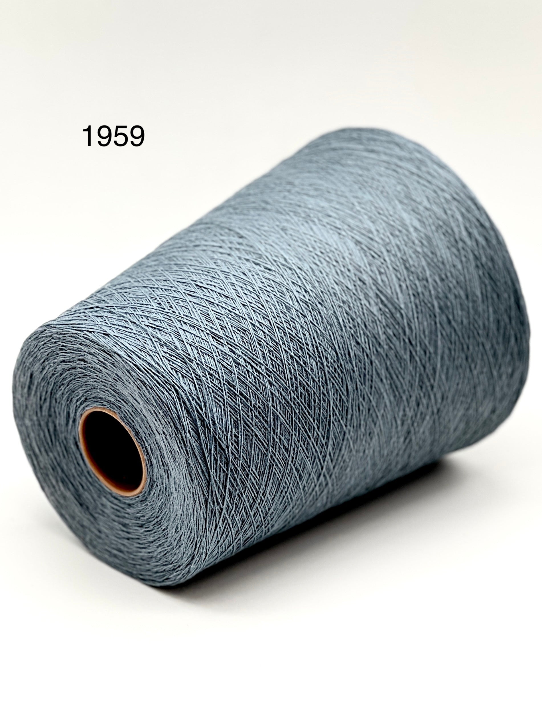 Premium extra-fine Italian merino lace weight yarn by Zegna Baruffa, available in a variety of solid and melange tones on cones, professionally curated for the luxury hand-knit and machine-knit collection at iDOKNiT.