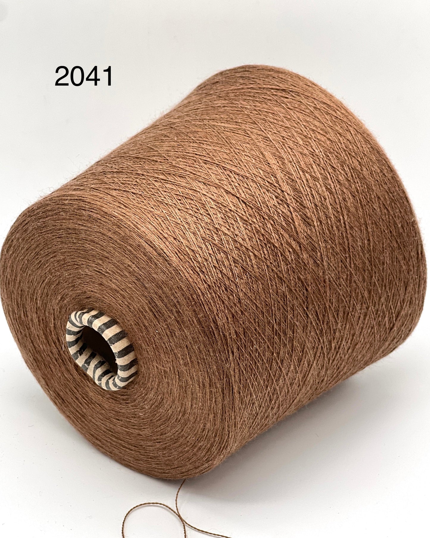 Close-up of iDOKNiT SÜDWOLLE GROUP VICTORIA yarn, showing the ultra-fine Lace weight texture of 100% Extrafine Merino Wool (Superwash) in a ready-to-use ball.