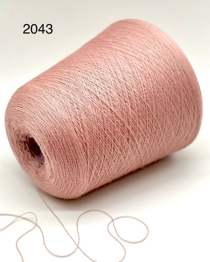 Premium iDOKNiT RiGo JASMINE 100% Extrafine Merino lace weight yarn in Nm 2/30, showcasing the elegant drape and superior Italian wool quality for luxury lace knitting.