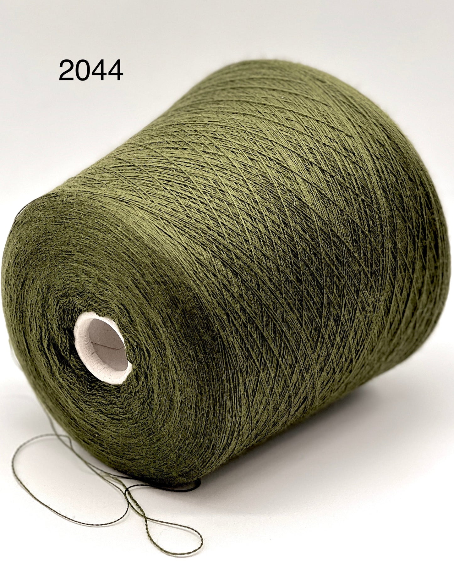 Premium iDOKNiT RiGo JASMINE 100% Extrafine Merino lace weight yarn in Nm 2/30, showcasing the elegant drape and superior Italian wool quality for luxury lace knitting.