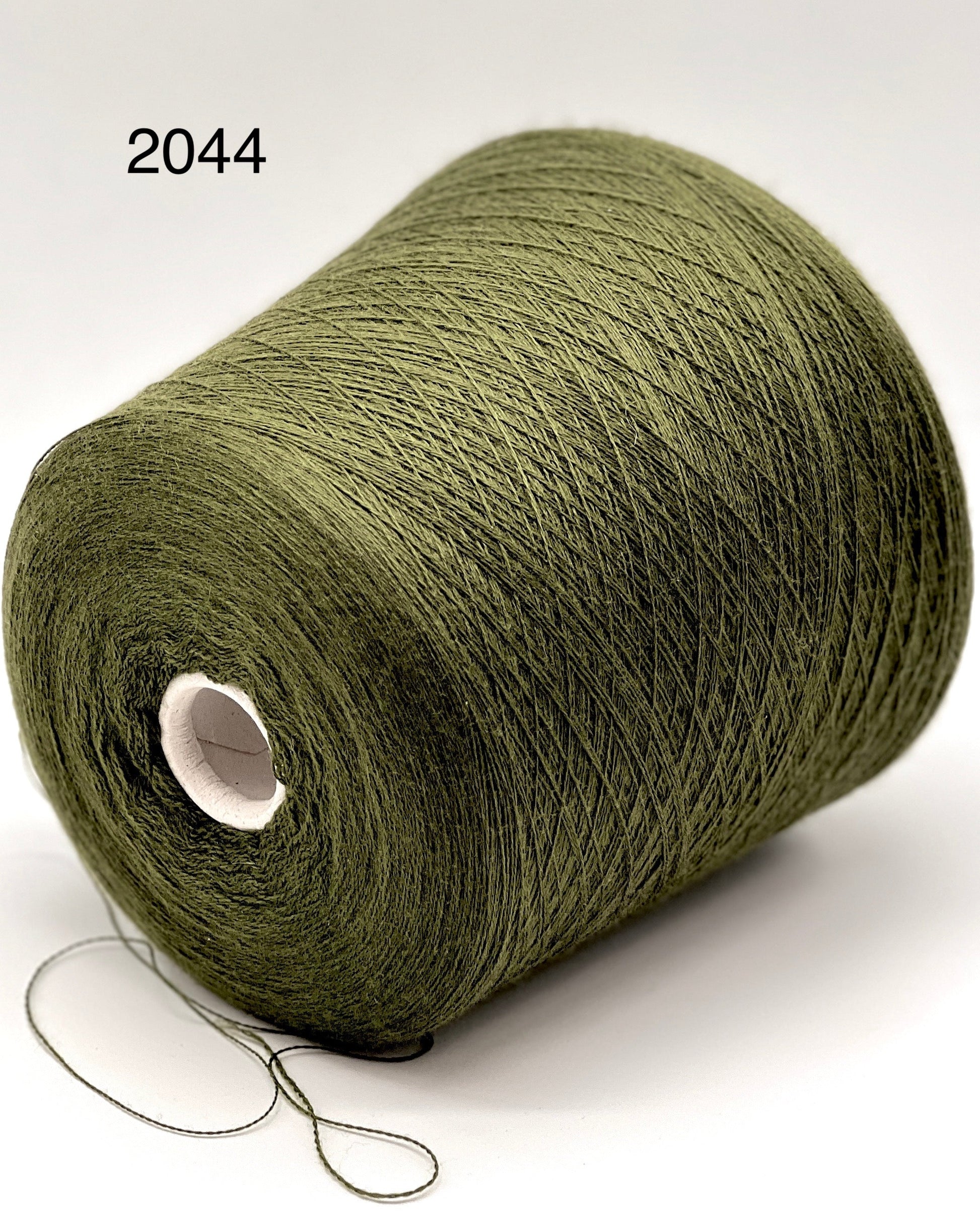 Premium iDOKNiT RiGo JASMINE 100% Extrafine Merino lace weight yarn in Nm 2/30, showcasing the elegant drape and superior Italian wool quality for luxury lace knitting.