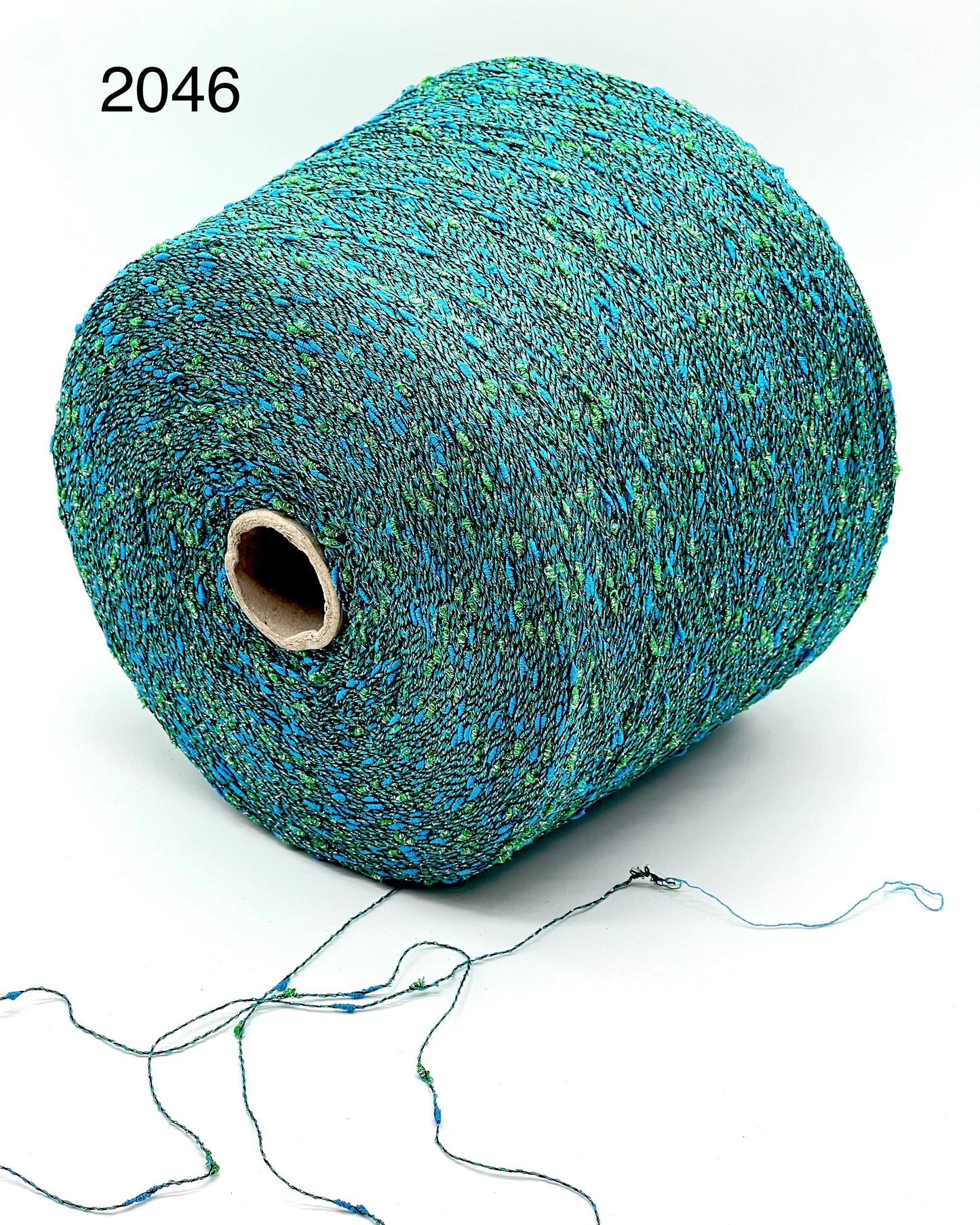 Exclusive iDOKNiT RiGo NODINO lace yarn featuring a radiant 67% viscose and 7% Lurex blend with a decorative Shishibriki texture for sophisticated Italian knitwear.