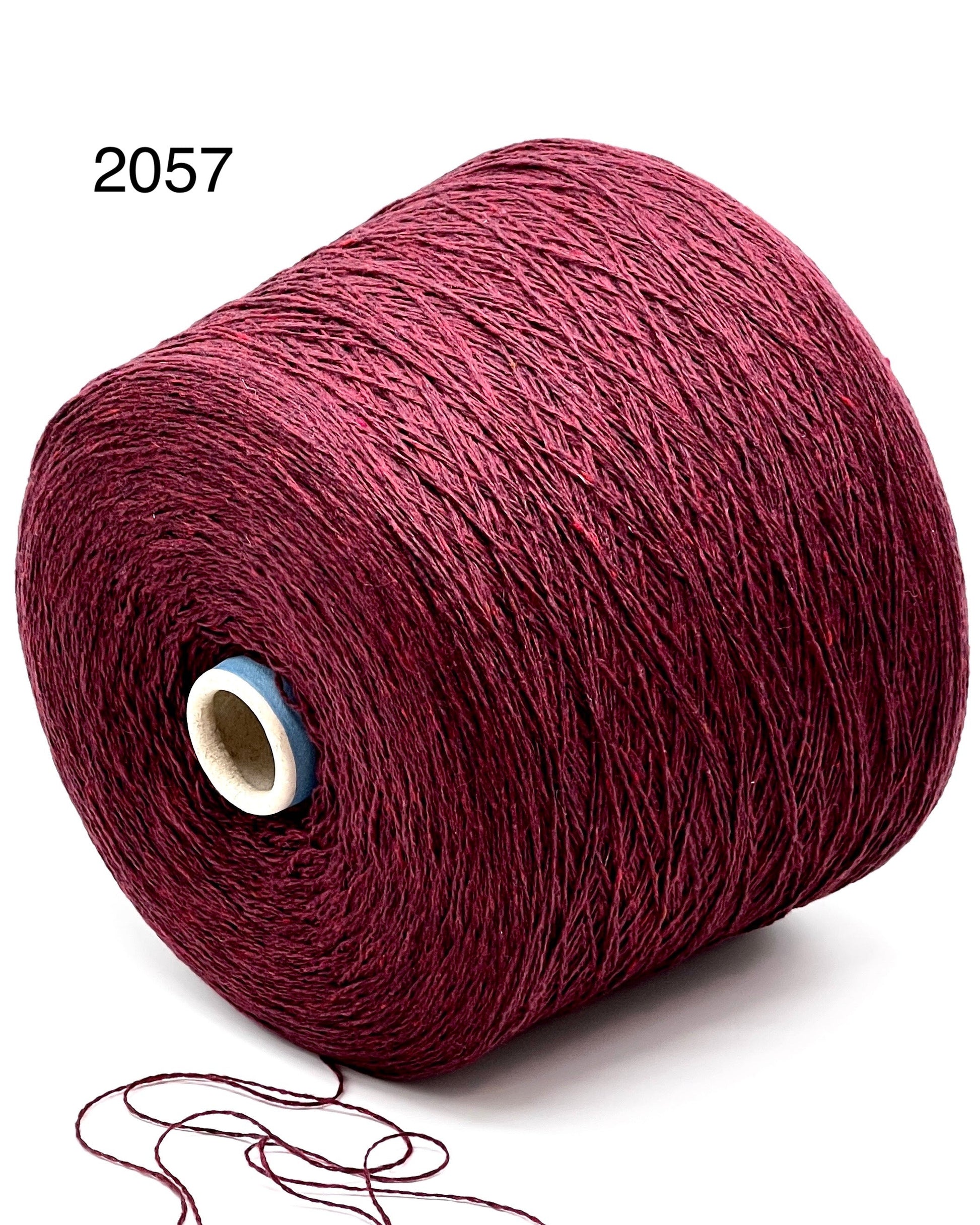 Elegant iDOKNiT SESIA SCOTLAND 100% Extrafine Merino Tweed lace yarn in Nm 2/14, showcasing a sophisticated rustic speckled texture and premium Italian wool quality.