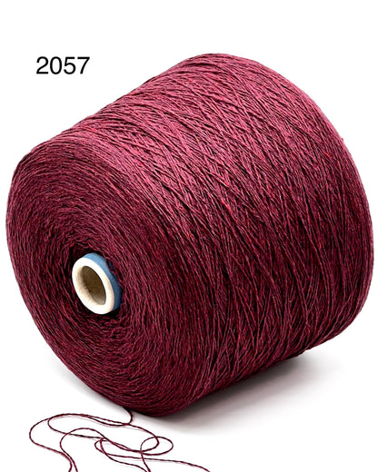 Elegant iDOKNiT SESIA SCOTLAND 100% Extrafine Merino Tweed lace yarn in Nm 2/14, showcasing a sophisticated rustic speckled texture and premium Italian wool quality.