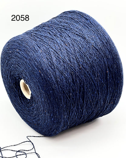 Elegant iDOKNiT SESIA SCOTLAND 100% Extrafine Merino Tweed lace yarn in Nm 2/14, showcasing a sophisticated rustic speckled texture and premium Italian wool quality.