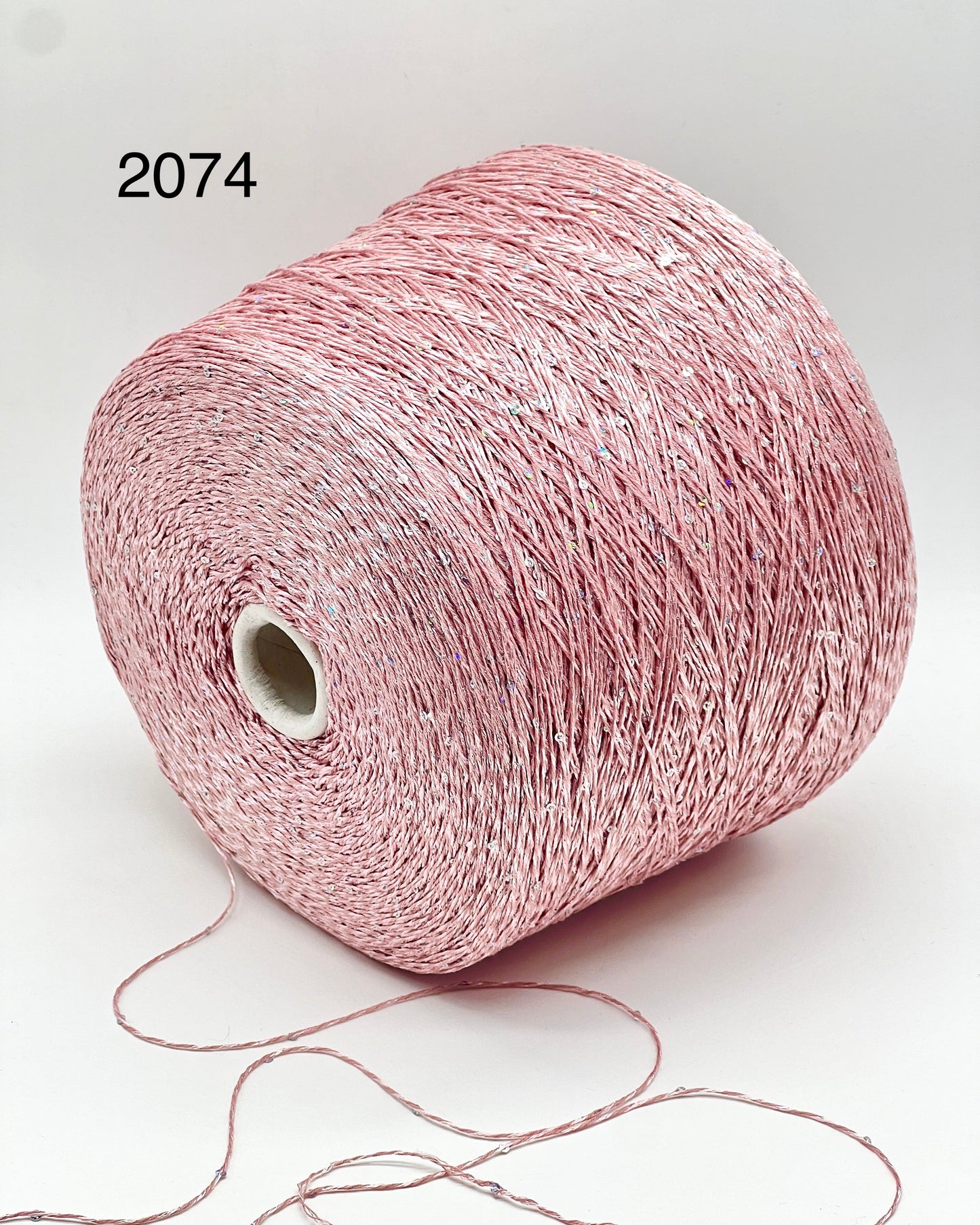 Professional grade RiGo STELLATO sport weight yarn from iDOKNiT, featuring a sophisticated 60% Italian cotton base with 2mm integrated paillettes. This authentic Italian-made yarn is curated by iDOKNiT to provide a refined shimmer and luxury finish for elegant, high-performance knitting projects.