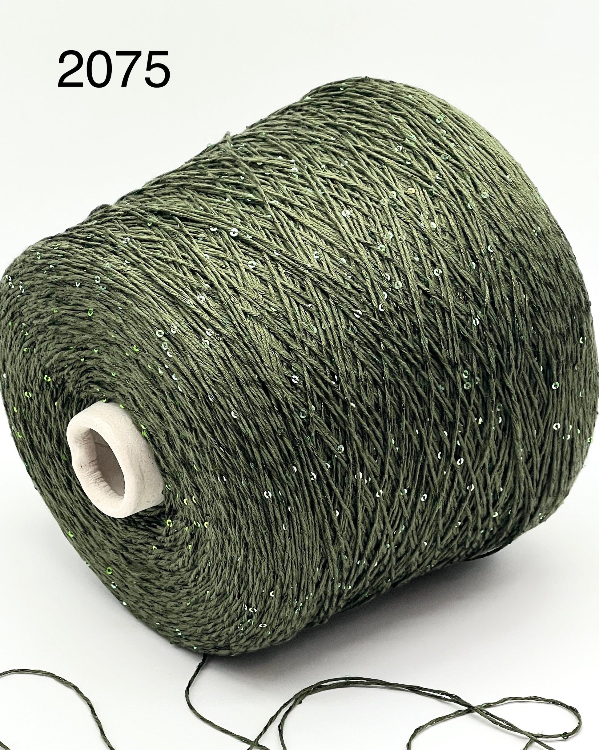 Professional grade RiGo STELLATO sport weight yarn from iDOKNiT, featuring a sophisticated 60% Italian cotton base with 2mm integrated paillettes. This authentic Italian-made yarn is curated by iDOKNiT to provide a refined shimmer and luxury finish for elegant, high-performance knitting projects.