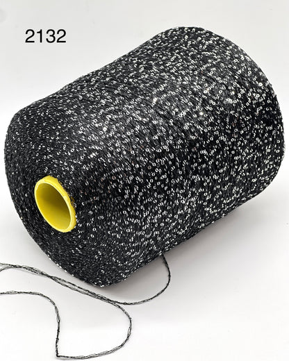 Elite iDOKNiT decorative lace weight yarn, SEQUINS by Cofil Italy. 100% polyester with micro-sequins, 460m/100g. Authentic Italian-made sparkling carry-along yarn curated by iDOKNiT to add texture and shine to professional knitting projects.