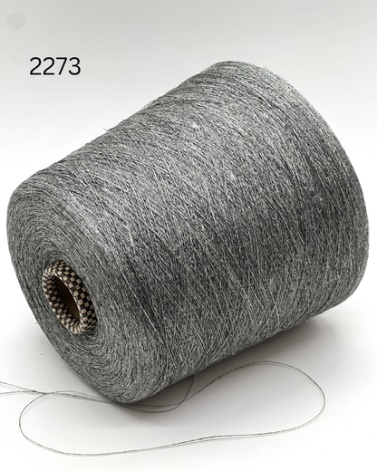 Servizi E Seta LINO MELANGE linen yarn cone 2000m lace weight Italy
100 percent linen melange yarn extra fine Italian thread close up
Italian linen yarn cone for knitting weaving blending melange texture
extra fine linen yarn strand detail breathable summer fiber
lino melange yarn texture close up Servizi E Seta Italy