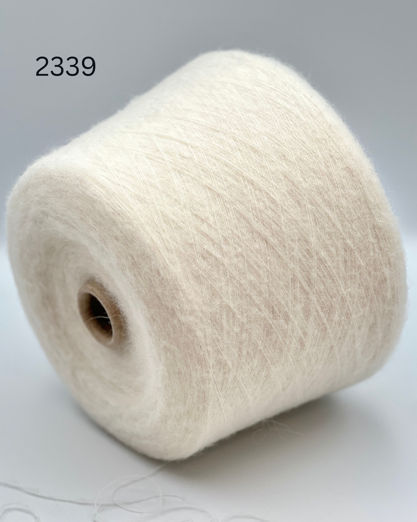 Luxury alpaca merino yarn SORIANO by Pecci Filati Italy
Soft fluffy Italian lace yarn with elegant alpaca halo
Pecci Filati SORIANO yarn close up showing airy texture
Luxury companion yarn for sweaters shawls and knitwear
Italian alpaca merino lace yarn for soft fluffy knitting