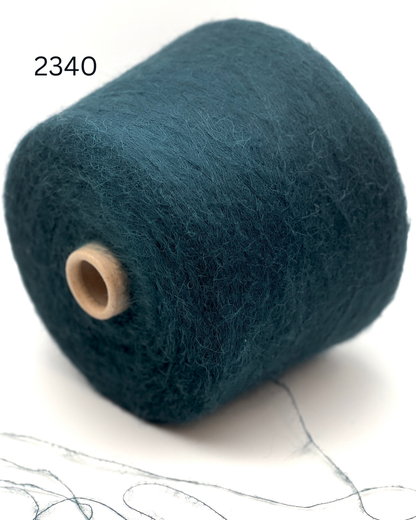 Luxury alpaca merino yarn SORIANO by Pecci Filati Italy
Soft fluffy Italian lace yarn with elegant alpaca halo
Pecci Filati SORIANO yarn close up showing airy texture
Luxury companion yarn for sweaters shawls and knitwear
Italian alpaca merino lace yarn for soft fluffy knitting