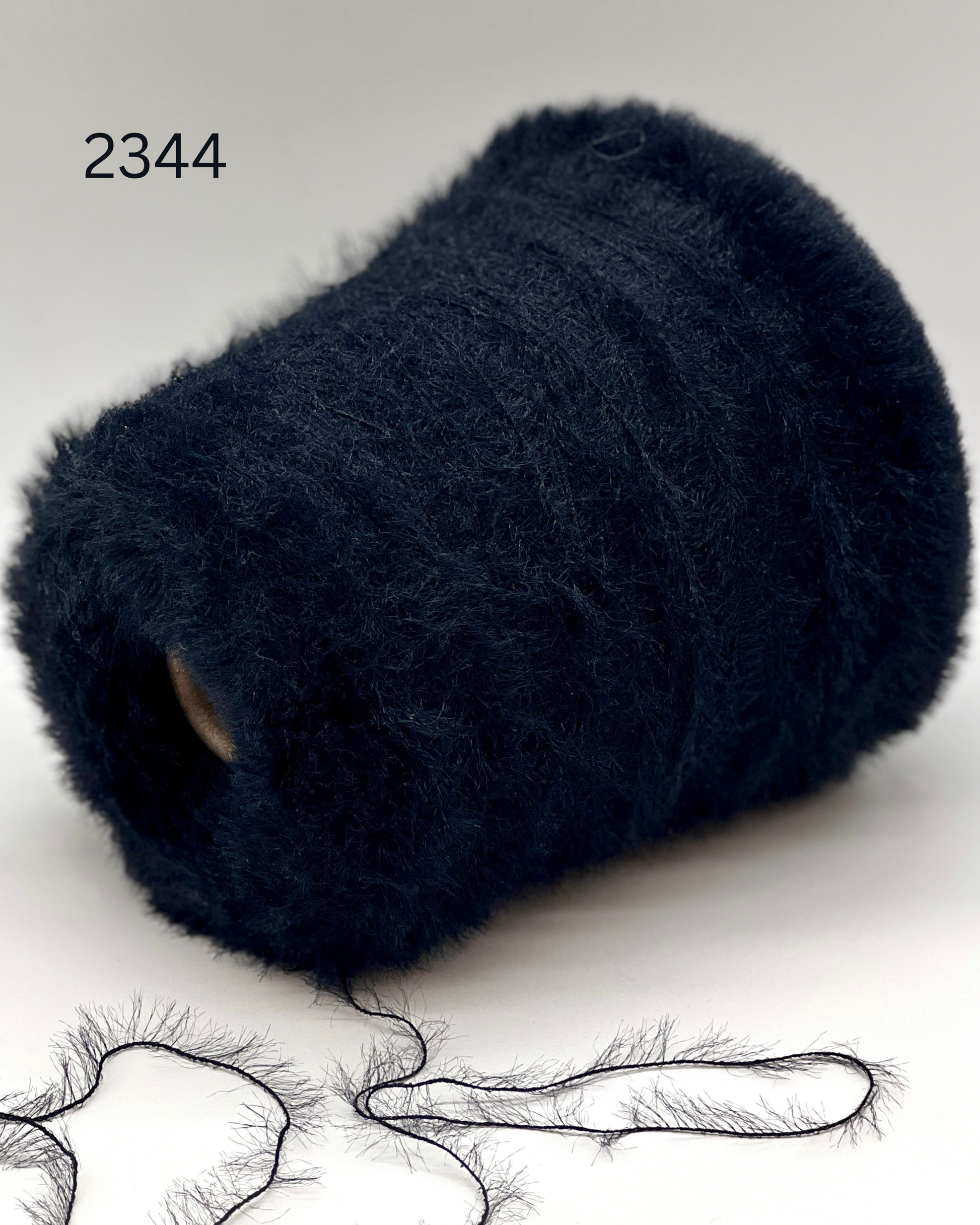 Luxury Italian fluffy stretch yarn with Swan’s Down texture
Soft stretchy lace yarn for ribbing socks and knitwear
Italian fluffy polyamide yarn close up showing airy texture
Stretchy Swan’s Down yarn for companion knitting projects
Lightweight fluffy Italian lace yarn for modern knitwear