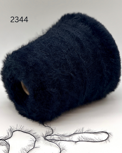 Luxury Italian fluffy stretch yarn with Swan’s Down texture
Soft stretchy lace yarn for ribbing socks and knitwear
Italian fluffy polyamide yarn close up showing airy texture
Stretchy Swan’s Down yarn for companion knitting projects
Lightweight fluffy Italian lace yarn for modern knitwear
