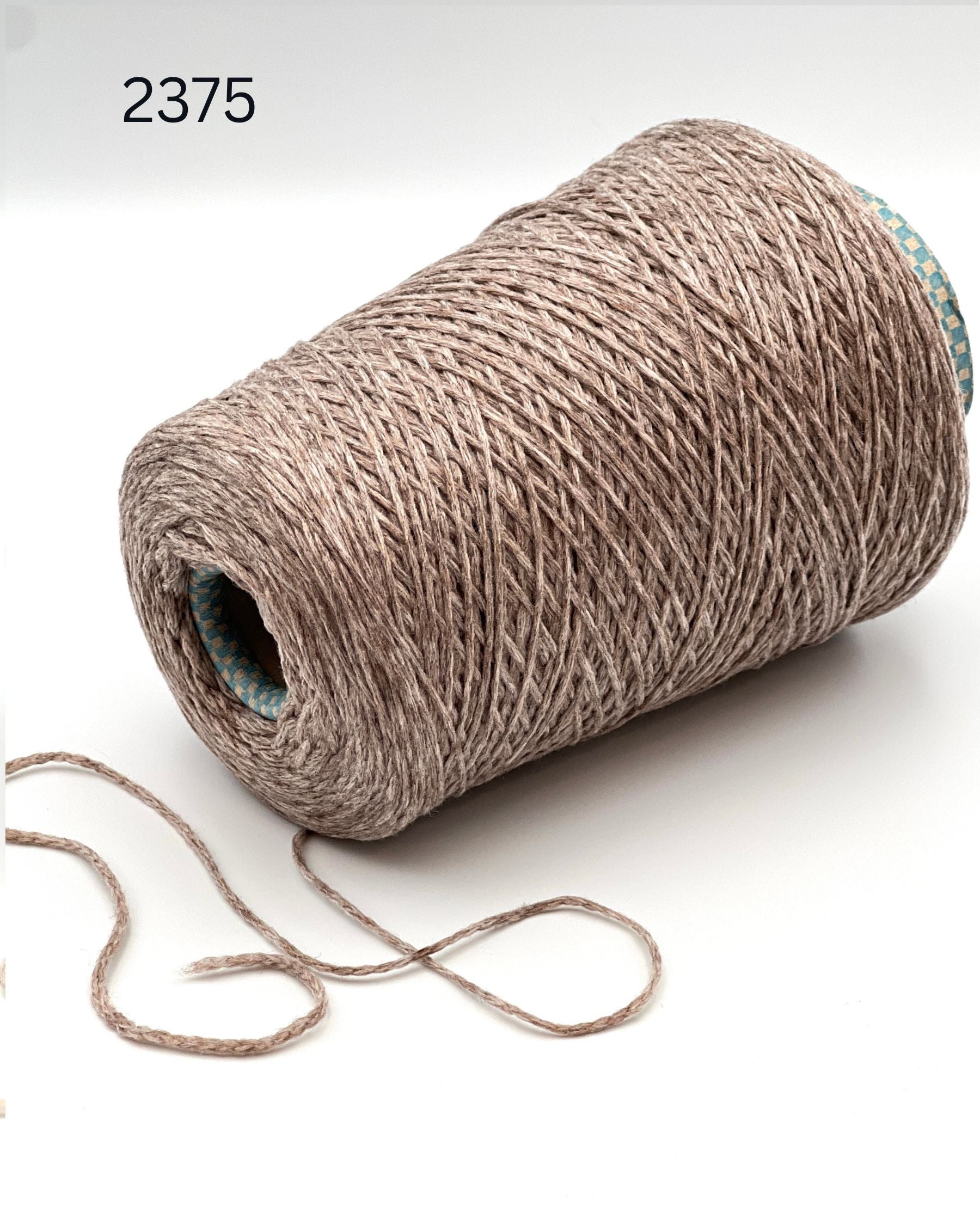 Rare CARIAGGI PIUMA 100% cashmere chainette yarn on original mill cone with original label and lofty cashmere texture.