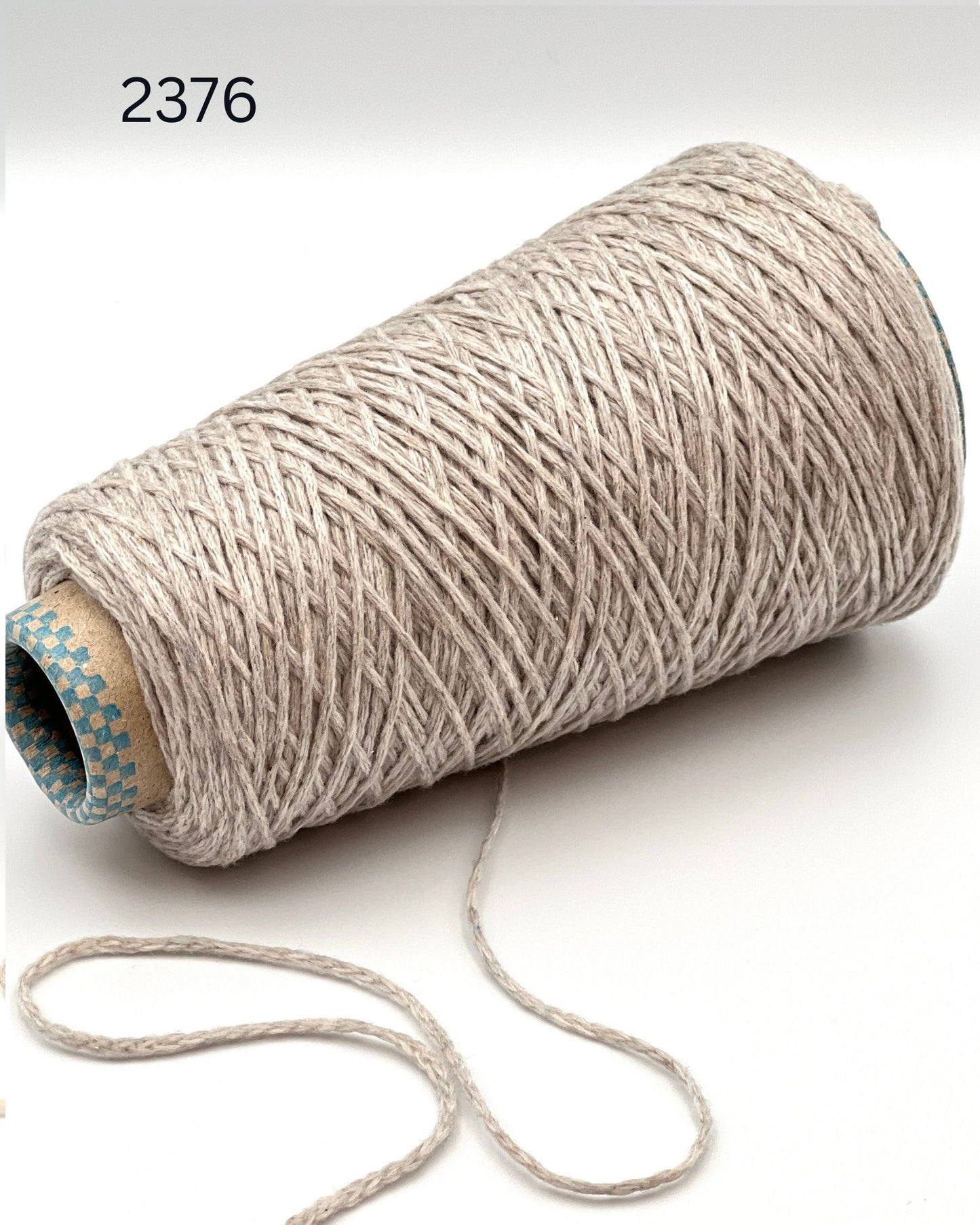 Rare CARIAGGI PIUMA 100% cashmere chainette yarn on original mill cone with original label and lofty cashmere texture.